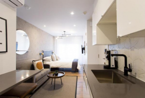 The Santamaria Golden Palms Studio by Den Stays